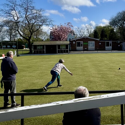 Joan playing bowls